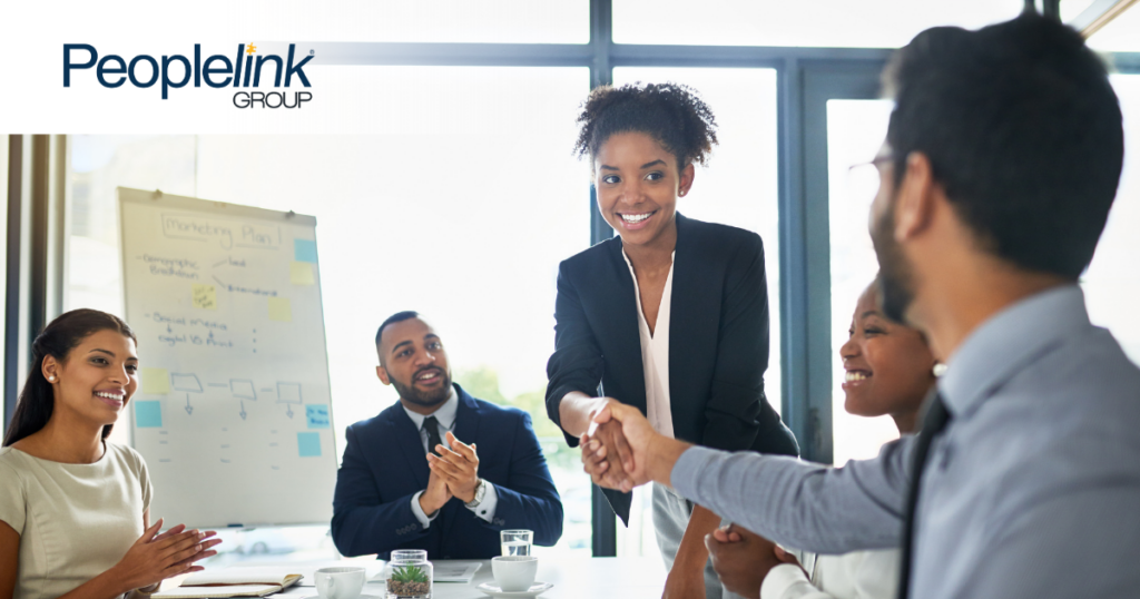 Team showing appreciation to their coworker.